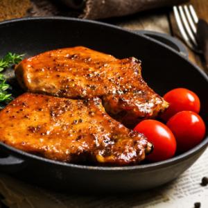 Pork chops marinated in rum and mustard